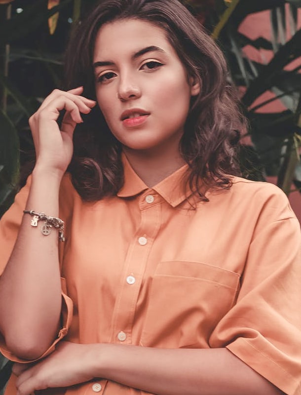 A girl posing for a photo wearing garments